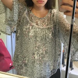 Flowing green silk shirt with hints of pink